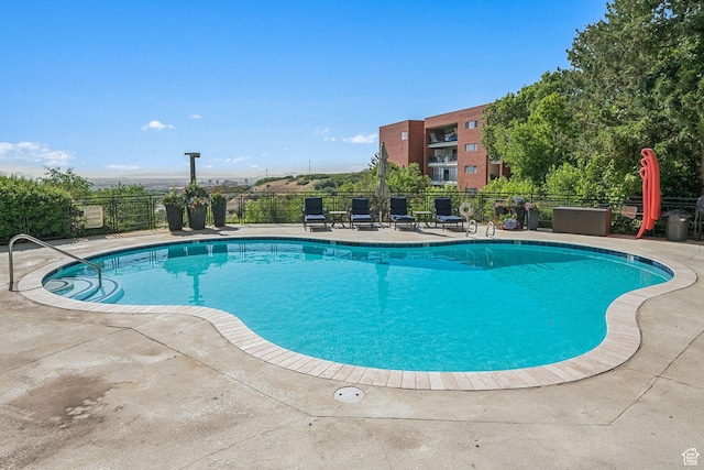 900 S Donner Way E Unit 405, Salt Lake City, UT 84108 - community pool featuring a patio area