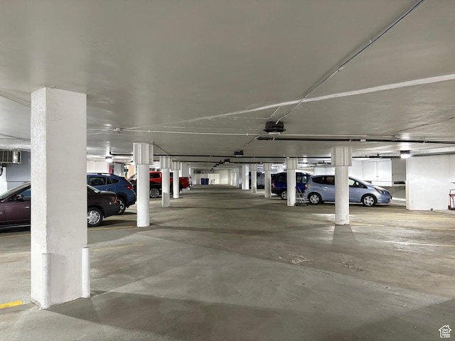 900 S Donner Way E Unit 405, Salt Lake City, UT 84108 - parking deck with a garage door opener