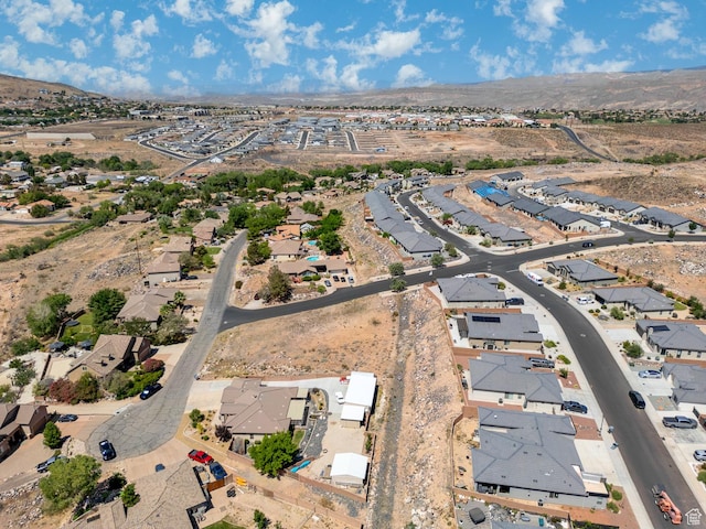 1430 W 365 N, Hurricane, UT 84737 - aerial view of property and surrounding area featuring nearby suburban area and a mountainous background