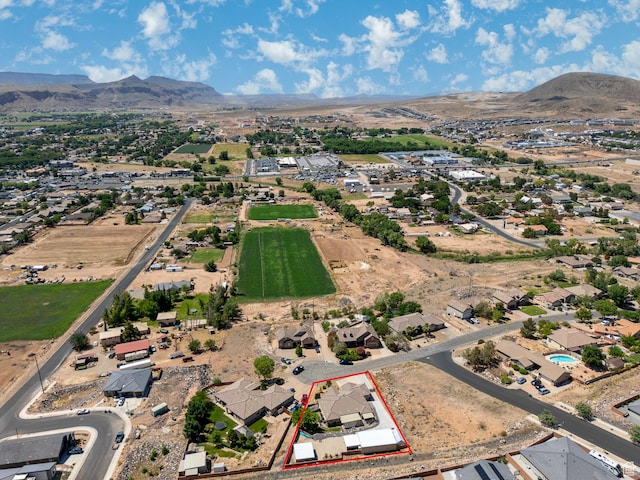 1430 W 365 N, Hurricane, UT 84737 - aerial view of property and surrounding area featuring a mountainous background and property parcel outlined