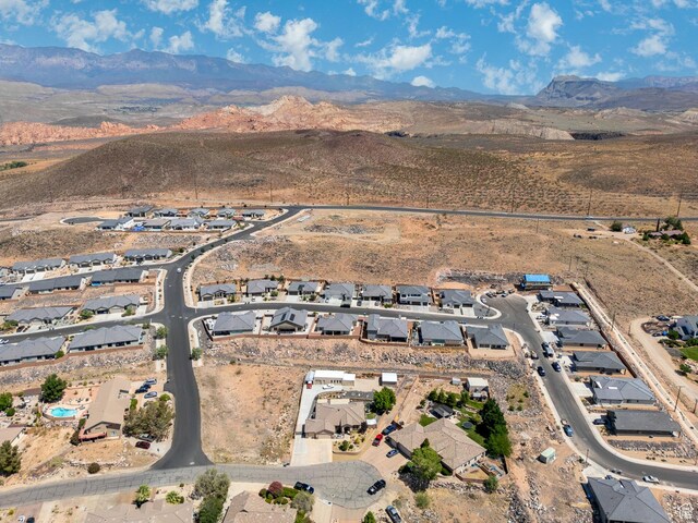 1430 W 365 N, Hurricane, UT 84737 - aerial view of property's location with a mountain backdrop and nearby suburban area
