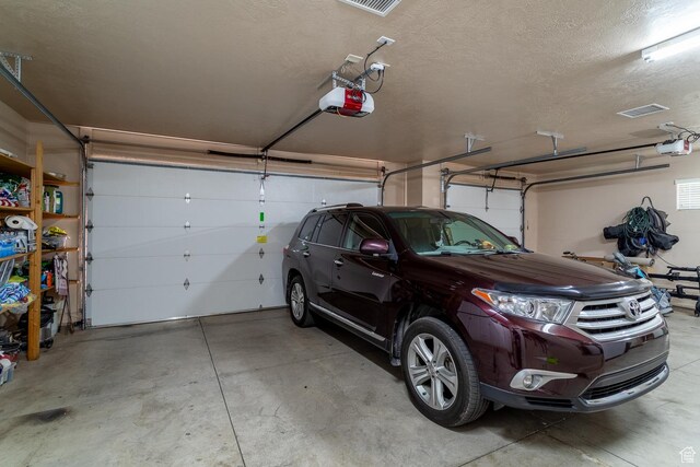 1430 W 365 N, Hurricane, UT 84737 - garage featuring a garage door opener