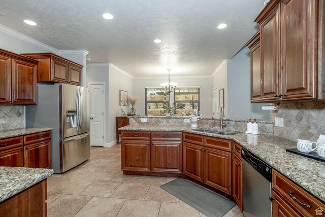 1430 W 365 N, Hurricane, UT 84737 - kitchen with stainless steel appliances, a chandelier, decorative backsplash, a peninsula, and recessed lighting