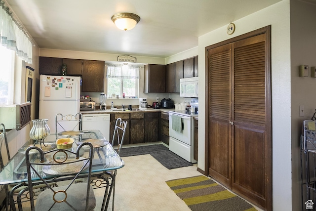 454 W 650 N, Vernal, UT 84078 - kitchen featuring white appliances, dark brown cabinetry, and light countertops