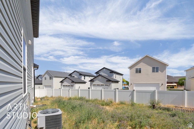 1789 N Aaron Dr E, Tooele, UT 84074 - view of yard with a residential view and a garage
