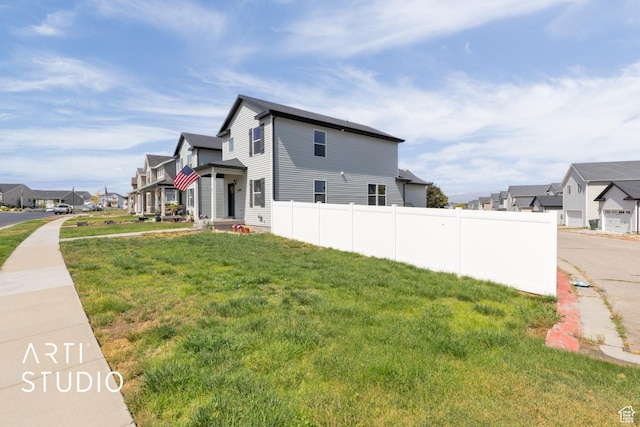 1789 N Aaron Dr E, Tooele, UT 84074 - view of side of property with a residential view