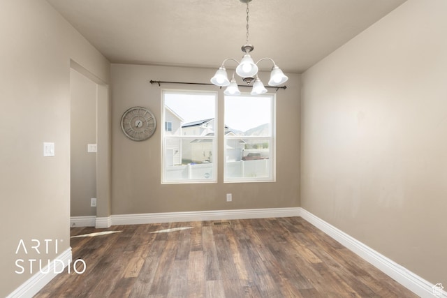 1789 N Aaron Dr E, Tooele, UT 84074 - unfurnished dining area featuring a chandelier and dark wood finished floors