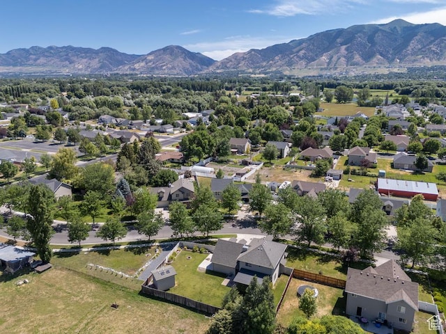1033 S Southgate Ct W, Logan, UT 84321 - aerial view of residential area with a mountain backdrop