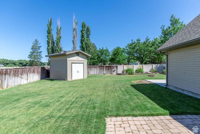 1033 S Southgate Ct W, Logan, UT 84321 - fenced backyard with a storage unit