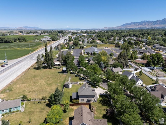 1033 S Southgate Ct W, Logan, UT 84321 - aerial overview of property's location featuring mountains and nearby suburban area