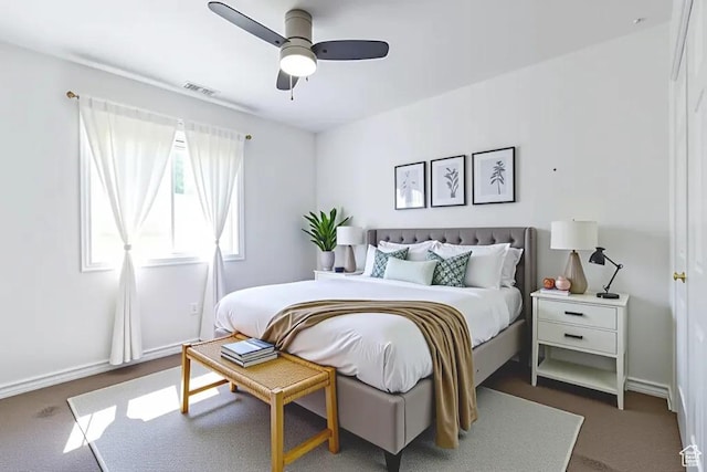 1033 S Southgate Ct W, Logan, UT 84321 - carpeted bedroom featuring a ceiling fan
