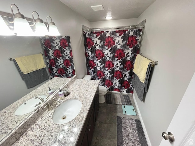 2433 N 1445 W, Clinton, UT 84015 - full bath with stone tile floors, vanity, and a shower with shower curtain