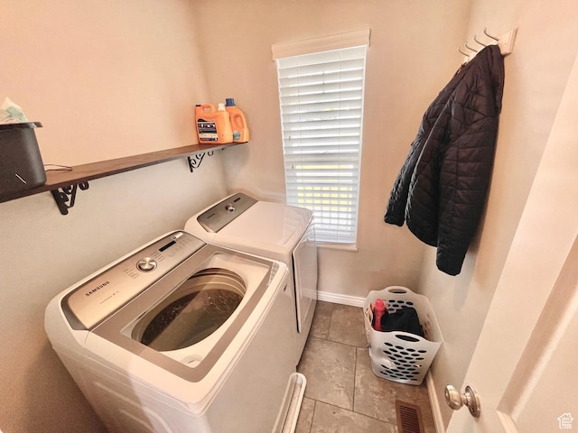 2433 N 1445 W, Clinton, UT 84015 - laundry area featuring washing machine and clothes dryer and tile patterned flooring
