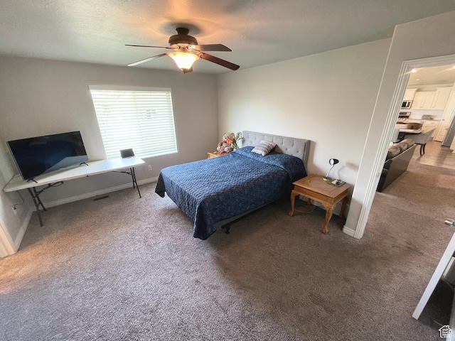 2433 N 1445 W, Clinton, UT 84015 - carpeted bedroom featuring baseboards and a ceiling fan