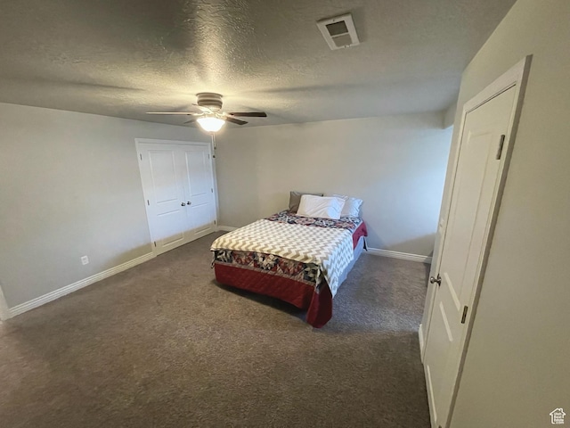 2433 N 1445 W, Clinton, UT 84015 - carpeted bedroom featuring a textured ceiling and ceiling fan