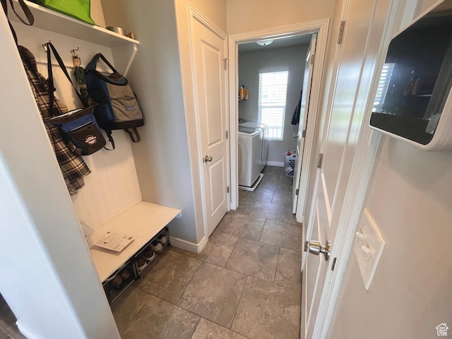 2433 N 1445 W, Clinton, UT 84015 - mudroom featuring washing machine and dryer and tile patterned flooring