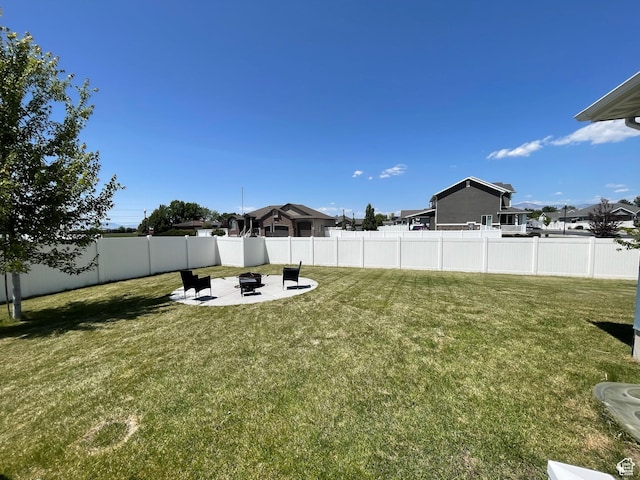 2433 N 1445 W, Clinton, UT 84015 - view of yard with a patio area and a fire pit