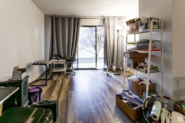 245 N Vine St Unit 205, Salt Lake City, UT 84103 - home office featuring wood finished floors and a textured ceiling