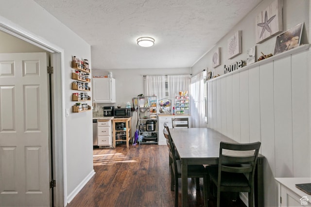 565 W 300 S, Provo, UT 84601 - dining space featuring dark wood finished floors and a textured ceiling