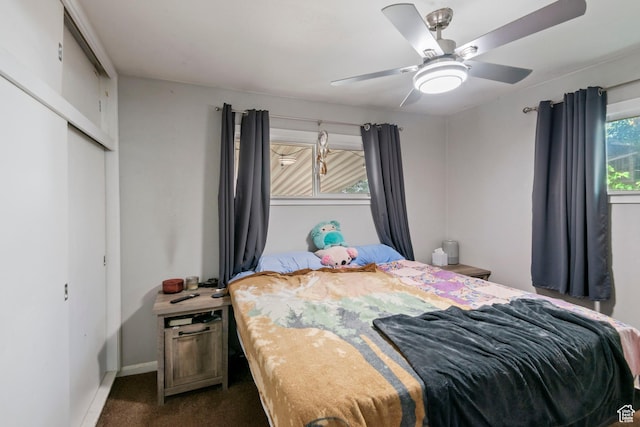 565 W 300 S, Provo, UT 84601 - bedroom with dark carpet, a closet, and ceiling fan