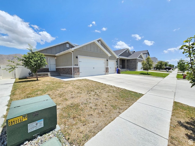 3538 N Willy Way Unit 167, Eagle Mountain, UT 84005 - craftsman house with board and batten siding, an attached garage, and concrete driveway