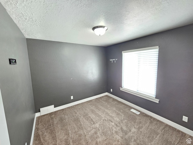 3538 N Willy Way Unit 167, Eagle Mountain, UT 84005 - empty room with carpet flooring and a textured ceiling
