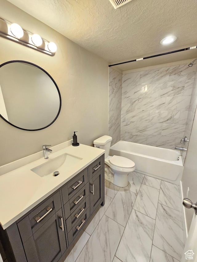 3538 N Willy Way Unit 167, Eagle Mountain, UT 84005 - full bath featuring marble look tiles, vanity, washtub / shower combination, a textured ceiling, and recessed lighting