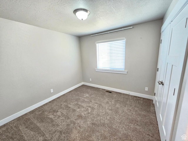 3538 N Willy Way Unit 167, Eagle Mountain, UT 84005 - carpeted spare room with a textured ceiling and baseboards