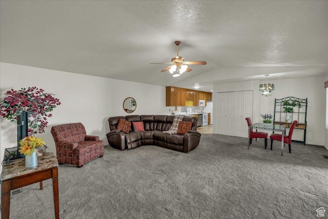 1331 N Dixie Downs Rd Unit 56, St George, UT 84770 - living room with a chandelier, light colored carpet, vaulted ceiling, a ceiling fan, and a textured ceiling
