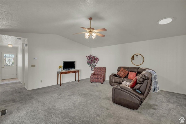 1331 N Dixie Downs Rd Unit 56, St George, UT 84770 - carpeted living area featuring vaulted ceiling, a ceiling fan, and a textured ceiling