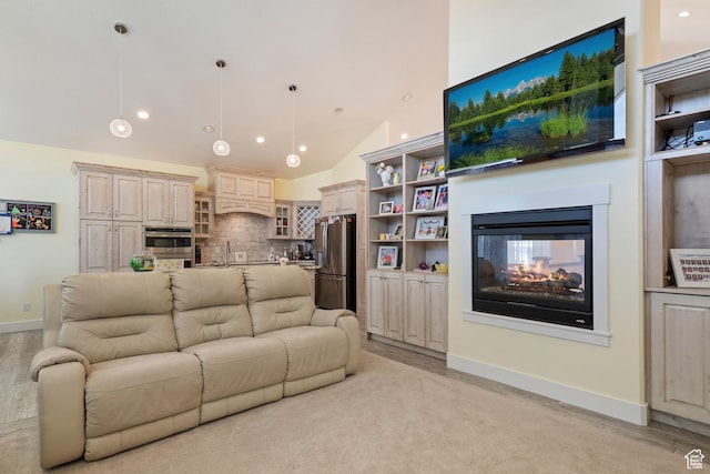 4925 W 3500 S, West Haven, UT 84401 - living area with recessed lighting, a multi sided fireplace, light wood-type flooring, and high vaulted ceiling