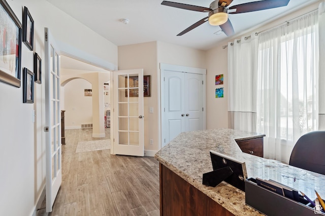4925 W 3500 S, West Haven, UT 84401 - office space featuring french doors, arched walkways, light wood-style flooring, and a ceiling fan