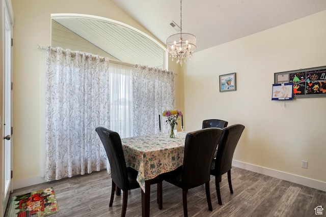 4925 W 3500 S, West Haven, UT 84401 - dining space featuring a chandelier, wood finished floors, and lofted ceiling