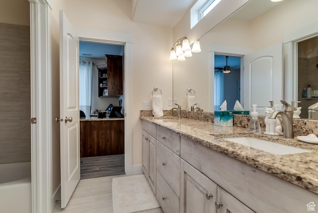 4925 W 3500 S, West Haven, UT 84401 - full bath featuring double vanity, a ceiling fan, and a tub