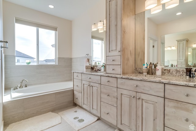 4925 W 3500 S, West Haven, UT 84401 - bathroom featuring double vanity, a bath, and tile patterned floors