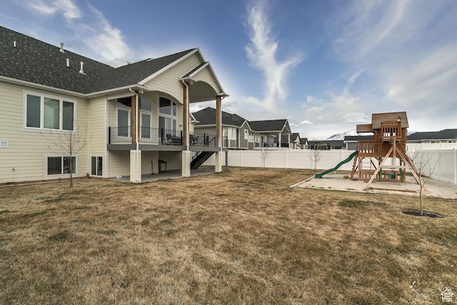 4925 W 3500 S, West Haven, UT 84401 - fenced backyard featuring a playground, stairway, and a patio