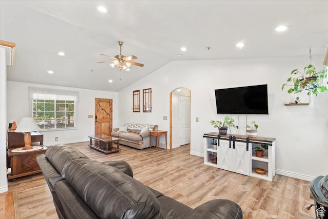 7217 W Mccuiston Ave S, Herriman, UT 84096 - living area with arched walkways, ceiling fan, wood finished floors, lofted ceiling, and recessed lighting