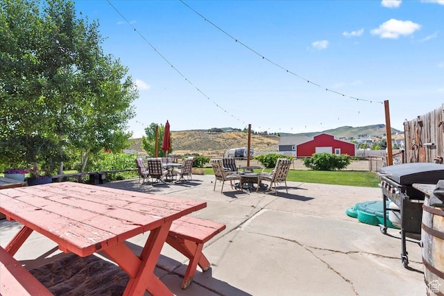 7217 W Mccuiston Ave S, Herriman, UT 84096 - fenced backyard featuring outdoor dining area, a patio area, and a grill