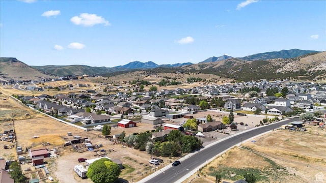 7217 W Mccuiston Ave S, Herriman, UT 84096 - aerial view of property's location with a mountain backdrop and nearby suburban area