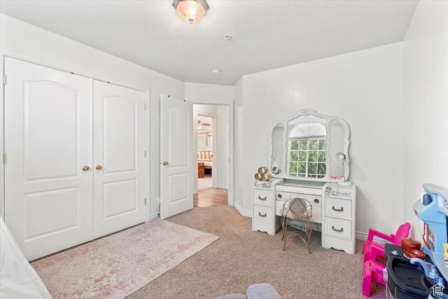 7217 W Mccuiston Ave S, Herriman, UT 84096 - bedroom featuring light colored carpet and a closet