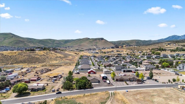 7217 W Mccuiston Ave S, Herriman, UT 84096 - aerial perspective of suburban area with a mountain backdrop