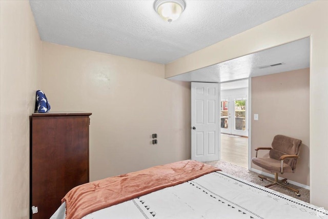 7217 W Mccuiston Ave S, Herriman, UT 84096 - carpeted bedroom with a textured ceiling and baseboards