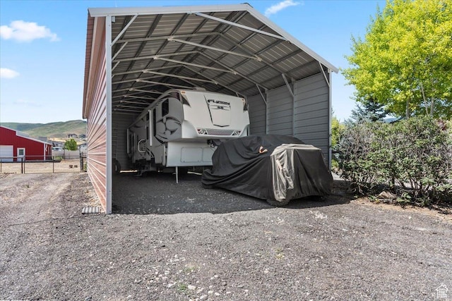 7217 W Mccuiston Ave S, Herriman, UT 84096 - view of parking featuring a detached carport and driveway