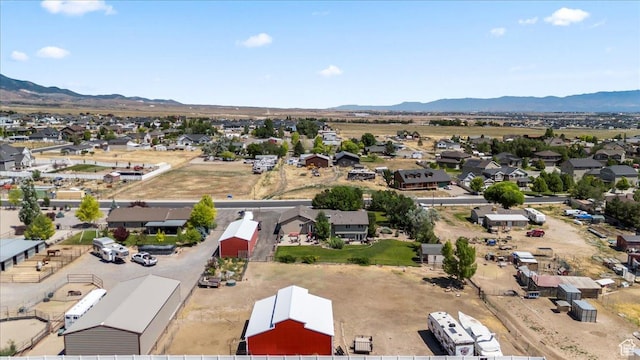 7217 W Mccuiston Ave S, Herriman, UT 84096 - aerial perspective of suburban area with a mountain backdrop