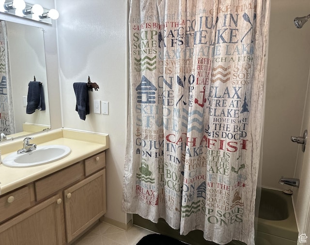 3077 S Edgemont Dr, Garden City, UT 84028 - bathroom featuring vanity, shower / bath combo, and tile patterned floors