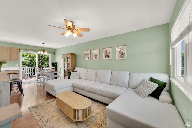 5318 S 4300 W, Hooper, UT 84315 - living room with light wood-style floors and ceiling fan