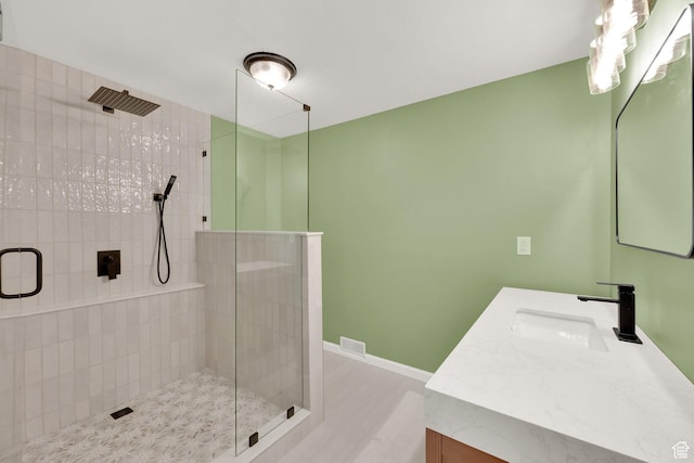 5318 S 4300 W, Hooper, UT 84315 - full bath with vanity, a tile shower, and wood finished floors