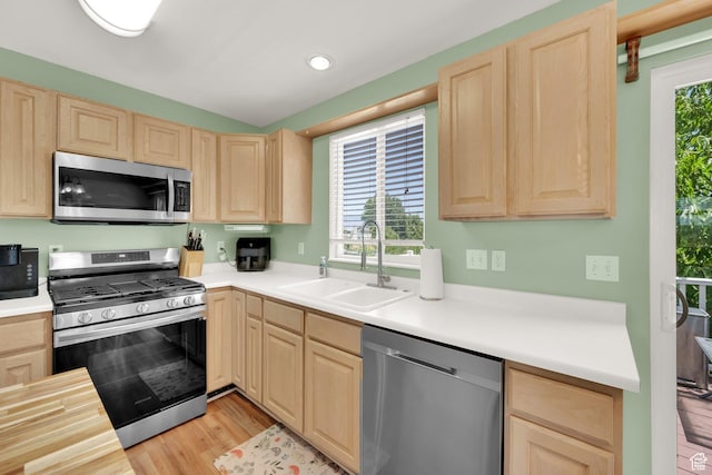 5318 S 4300 W, Hooper, UT 84315 - kitchen featuring stainless steel appliances, light brown cabinets, and light countertops