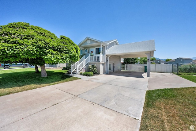 5318 S 4300 W, Hooper, UT 84315 - raised beach house featuring driveway, a porch, and stairs