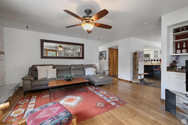 1035 Park Ave Unit 7-G, Park City, UT 84060 - living area featuring a ceiling fan and wood finished floors